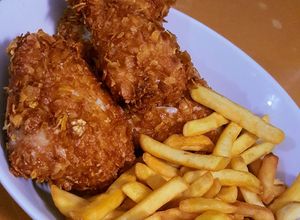 Une photo de Poulet frit aux épices et Corn-flakes