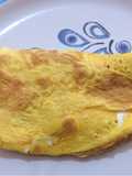 Omelette con jamón y queso