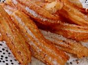 Una foto de churros al sarten
