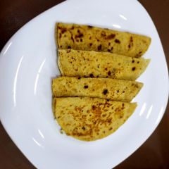Rotli stuffed with Jibno and Mint Jibna Feta cheese Sudan A picture of Rotli stuffed with Jibno and Mint Jibna Feta cheese Sudan.