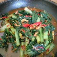A picture of Tumis Sayur Sawi Hijau Sederhana.