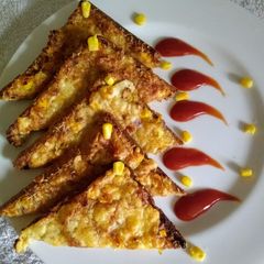 A picture of Onion cheesy corn toast.