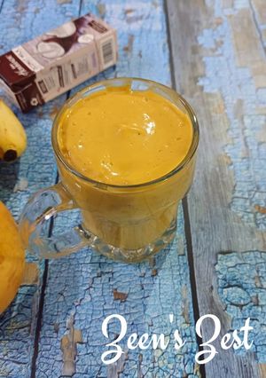 A picture of 5 minutes Mango and Karpooravalli Banana Smoothie.