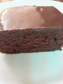 A picture of MOIST CHOCOLATE CAKE,Cocoa Ganache 😊.