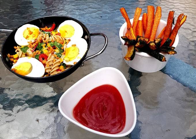 Veg Pasta with Egg and flavoured bacon bits carrot chips + Dip