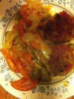 Une photo de Galettes de veau aux oignons olives et tomates