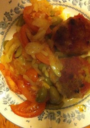 Une photo de Galettes de veau aux oignons olives et tomates