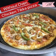 A picture of Chicken Tikka pizza without oven.