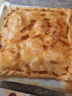 Una foto de Empanada con un poco de todo