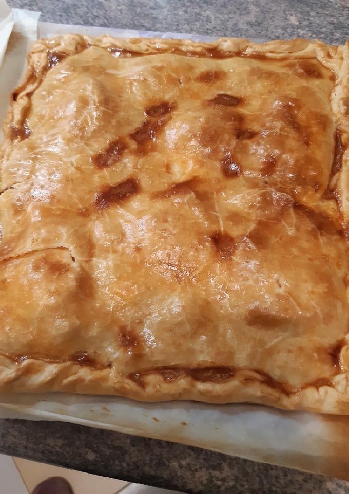 Una foto de Empanada con un poco de todo