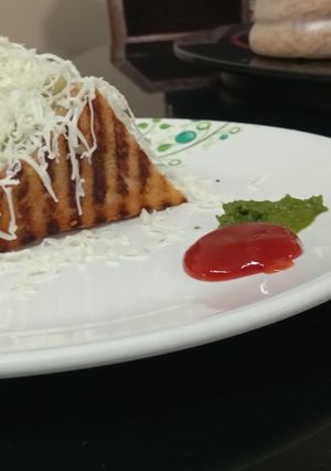 A picture of Cheesey veg club sandwich.