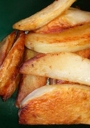 Una foto de Papas rústicas en sartén essen