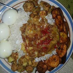 A picture of Coconut rice wit cabaje sauce.