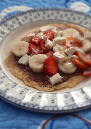 A picture of Strawberry and banana crepes.