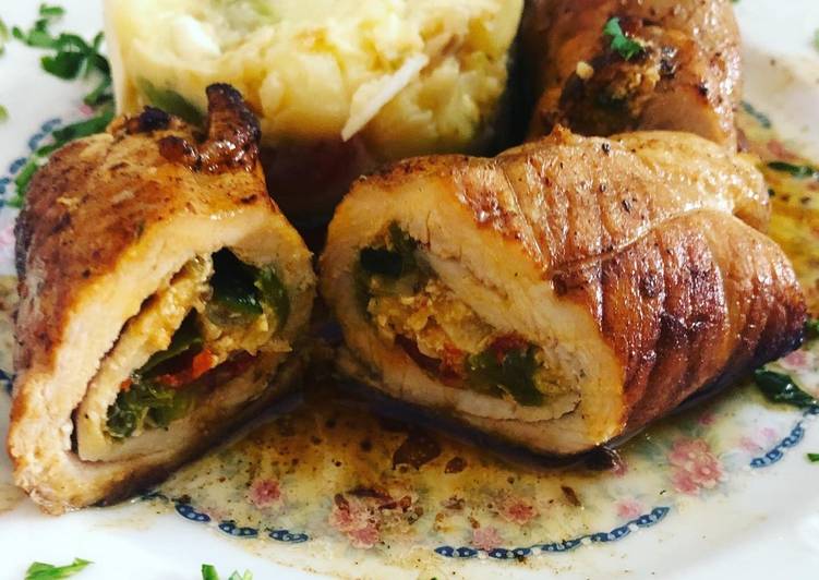 Rollitos de lomo rellenos de verdura y guarnición de ensalada campera