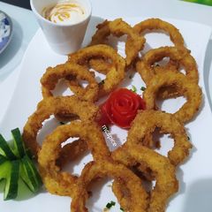 A picture of Crispy onion rings.
