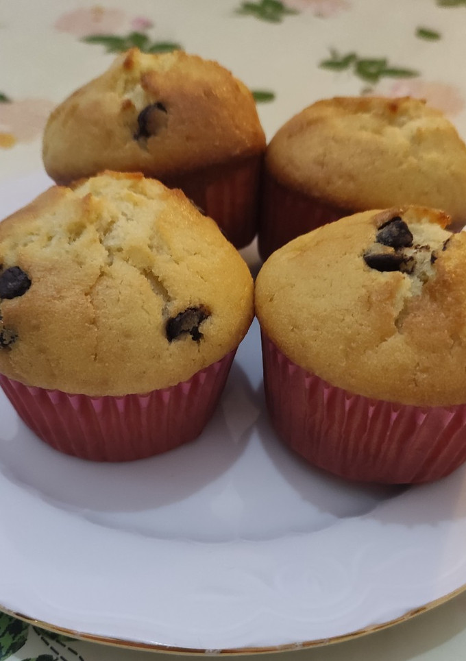 Una foto de Magdalenas de nata y pepitas de chocolate