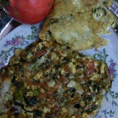 A picture of Veggies stuffed omelette.