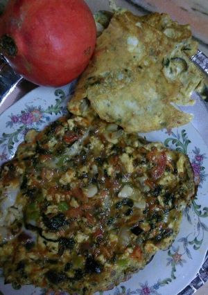 A picture of Veggies stuffed omelette.