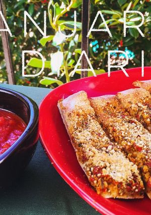Una foto de Colines Con Pesto y Queso Parmesano Vegano (Breadsticks)