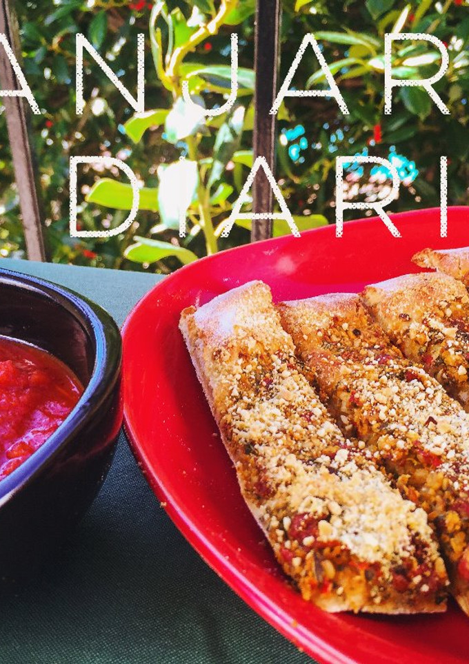 Una foto de Colines Con Pesto y Queso Parmesano Vegano (Breadsticks)