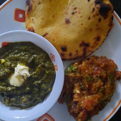 Sarson ka Saag with Besan ki Roti A picture of Sarson ka Saag with Besan ki Roti.