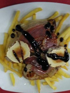 Una foto de Solomillo gratinado