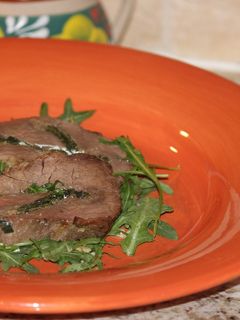 Una foto de Rollo de carne relleno de espinaca y queso