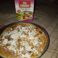 A picture of Paneer Paratha pizza.