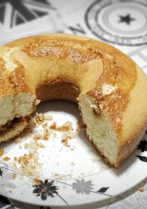 Una foto de Torta de coco con dulce de leche