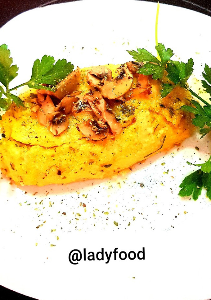 Una foto de Flan de polenta relleno de champiñones, espinacas y grana padano