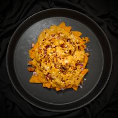 Cheesy Chicken Nachos A picture of Cheesy Chicken Nachos.