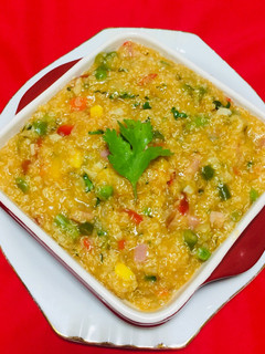 Una foto de Guisado de Quinua con Tocino y Vegetales!