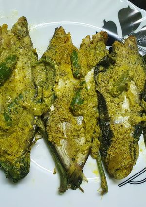A picture of Steamed Pabda Fish in Bottle Gourd Leaf (Lau Patai Pabda Paturi).