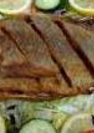 Una foto de  Mojarra al mojo de ajo