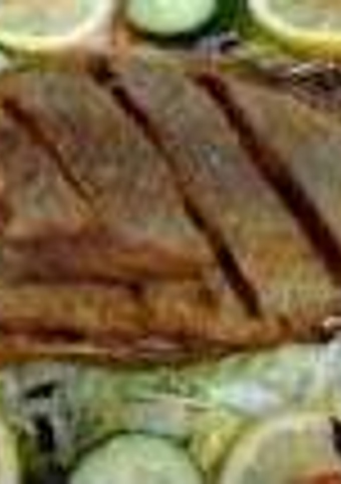 Una foto de  Mojarra al mojo de ajo