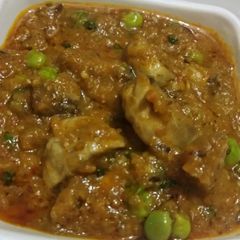 A picture of Mushroom with green peas.
