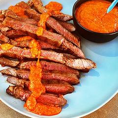 A picture of Grilled Wagyu Sirloin Tip Steak with Peri Peri Sauce.