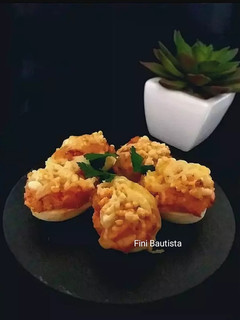 Una foto de Huevos rellenos de atún gratinados