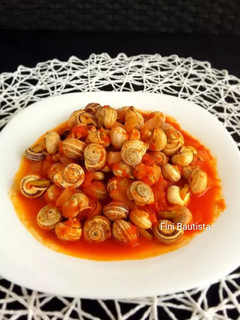 Una foto de Caracoles en salsa de tomate