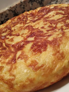 Una foto de Tortilla de patatas con cebolla