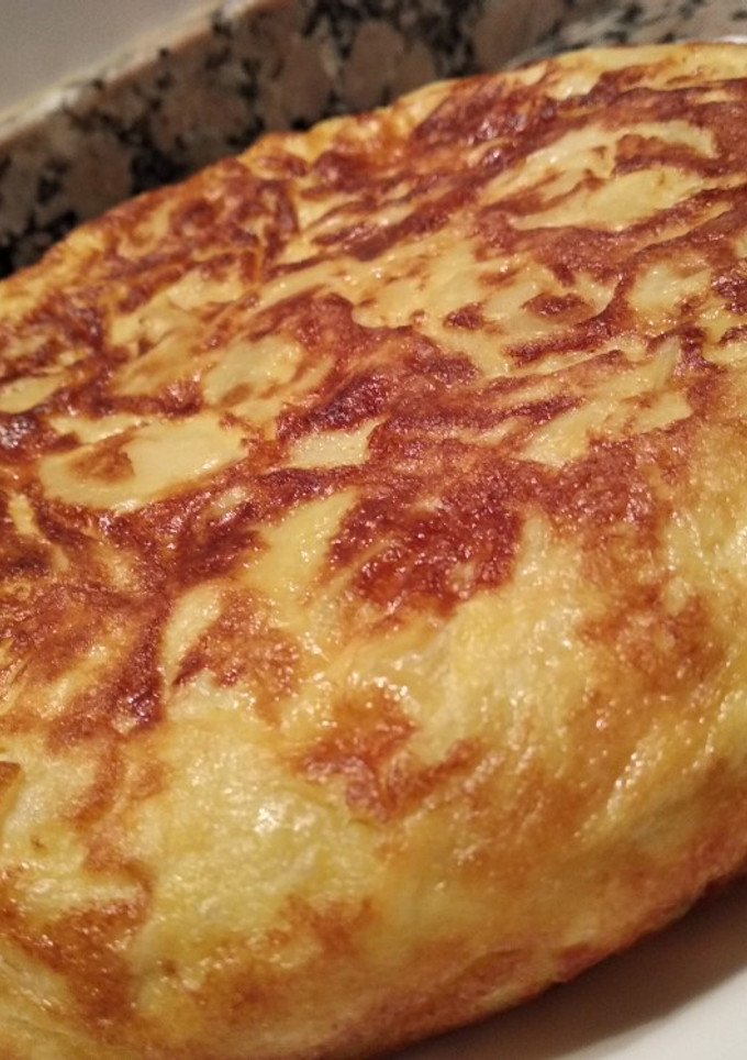 Una foto de Tortilla de patatas con cebolla