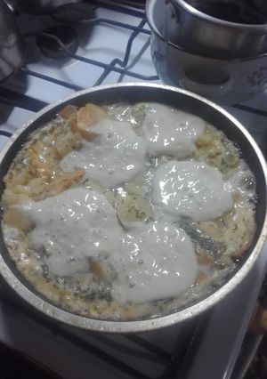 Una foto de Tortilla de papas en juliana con queso