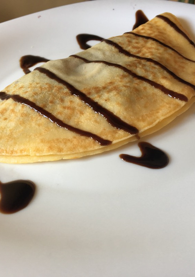 Una foto de Crepes de queso de cabra y mermelada de arándanos