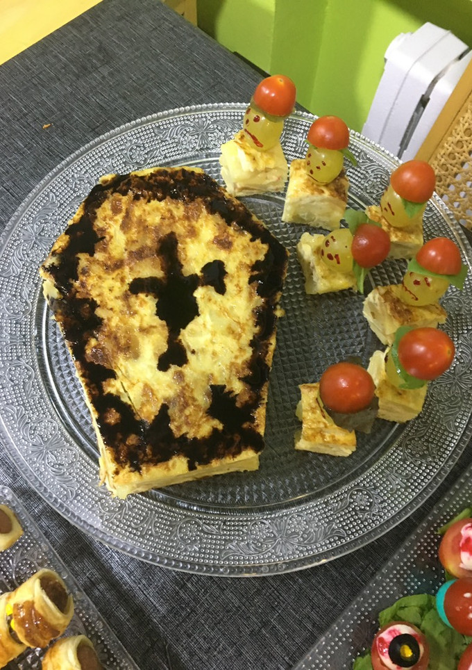 Una foto de Tortilla de patatas terroríficamente terrorífica 🧙‍♀️👻💀☠️👽