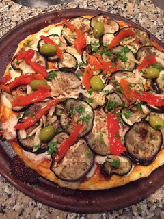 Una foto de Pizza de berenjenas