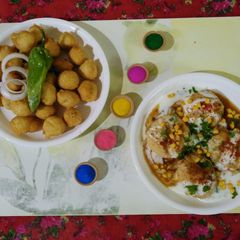 A picture of Dahi vada and dal vada (Holi festival).