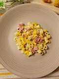 Ditaloni rigati pancetta croccante e cavolfiore giallo