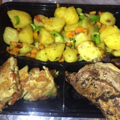 A picture of Stir fry potatoes,egg rolls&grilled chicken.