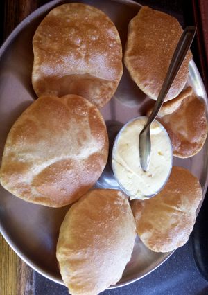 A picture of Full of love: shrikhand and puri.